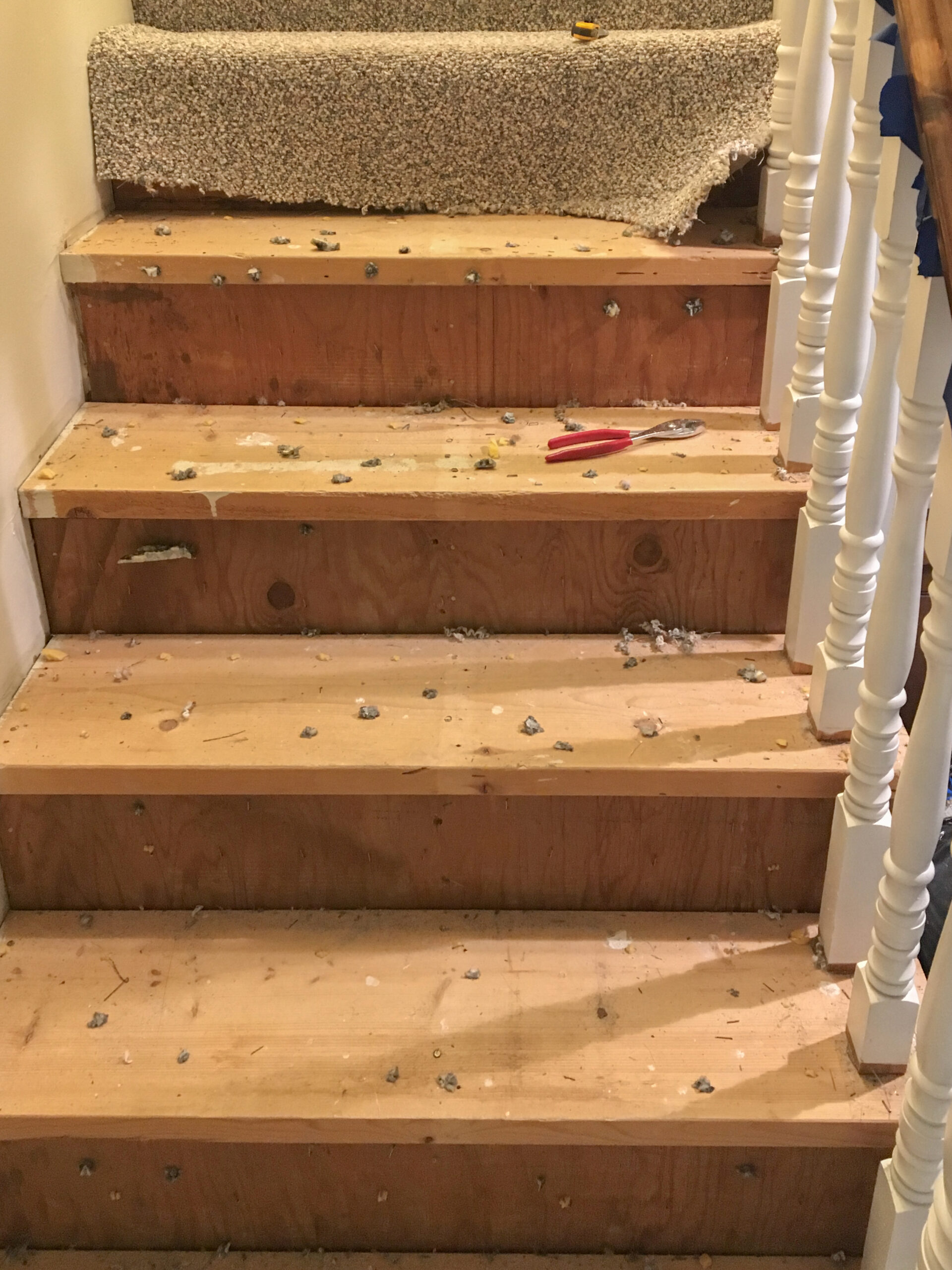 how to install carpet runner on stairs over carpet